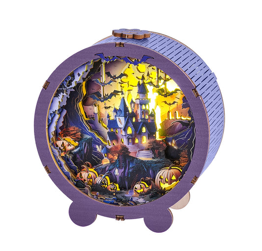 3D wooden puzzle night light featuring a Halloween castle scene with pumpkins and bats, illuminating the spooky landscape.