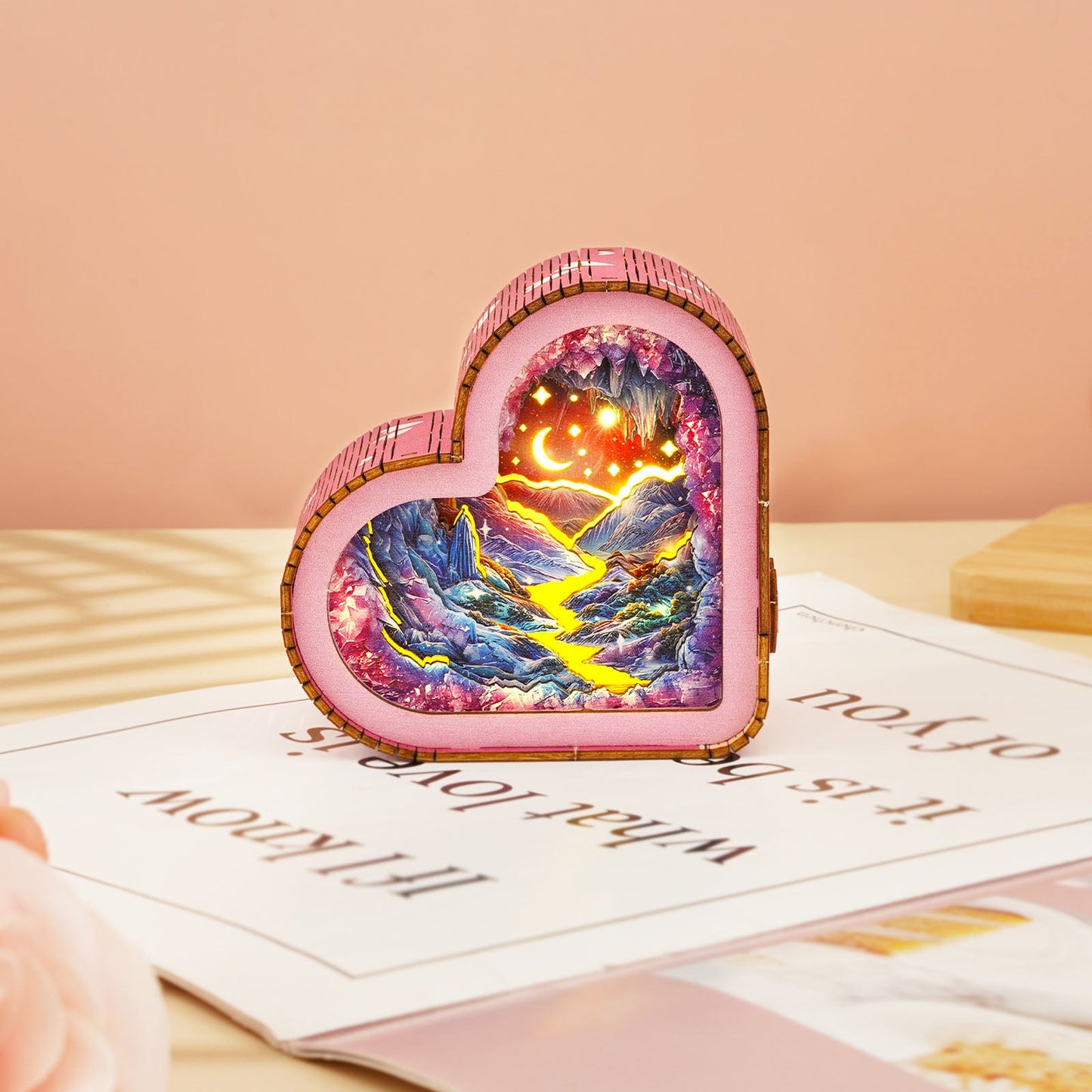 Dreamy Mine Cave Kit heart-shaped wooden puzzle night light illuminating a scenic landscape with mountains and rivers.
