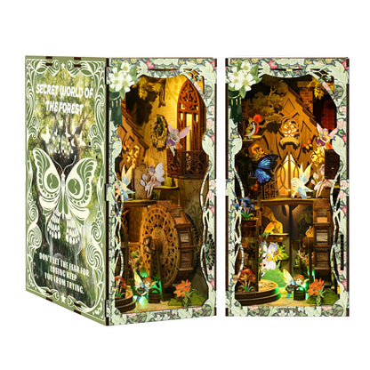 Secret Forest DIY Book Nook Kit featuring intricate designs, fairy lights, and musical elements in a whimsical woodland setting.