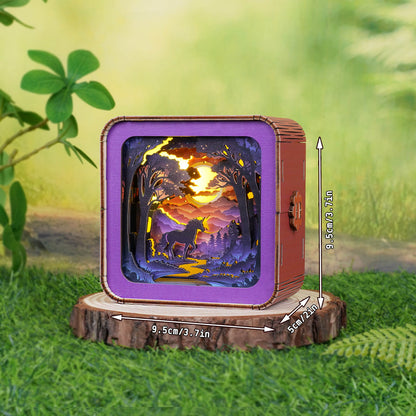 Forest Fantasy Unicorn Kit 3D wooden puzzle night light on a wooden stand, showcasing a glowing unicorn in a scenic landscape.