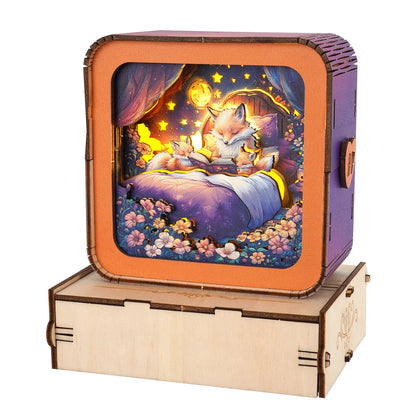 3D wooden puzzle night light featuring a cozy scene of foxes reading bedtime stories.