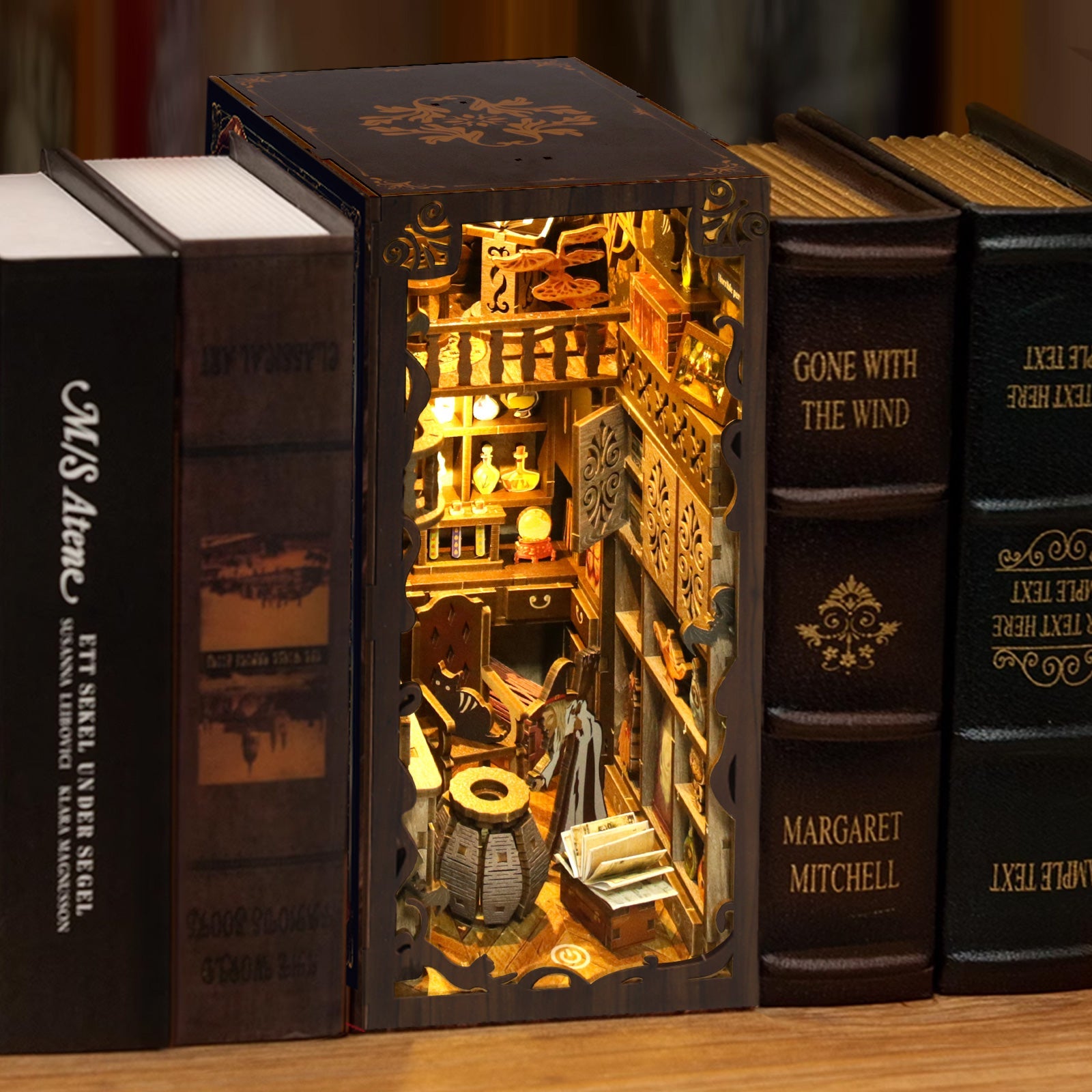 Illuminated DIY book nook kit showcasing detailed music-themed decor inside a wooden puzzle design.