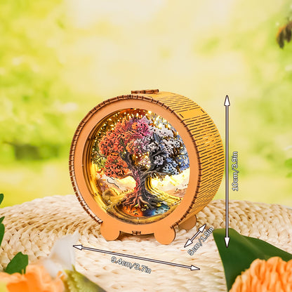3D Wooden Puzzle Night Light featuring a colorful Tree of Life design, displayed on a textured table with natural background.