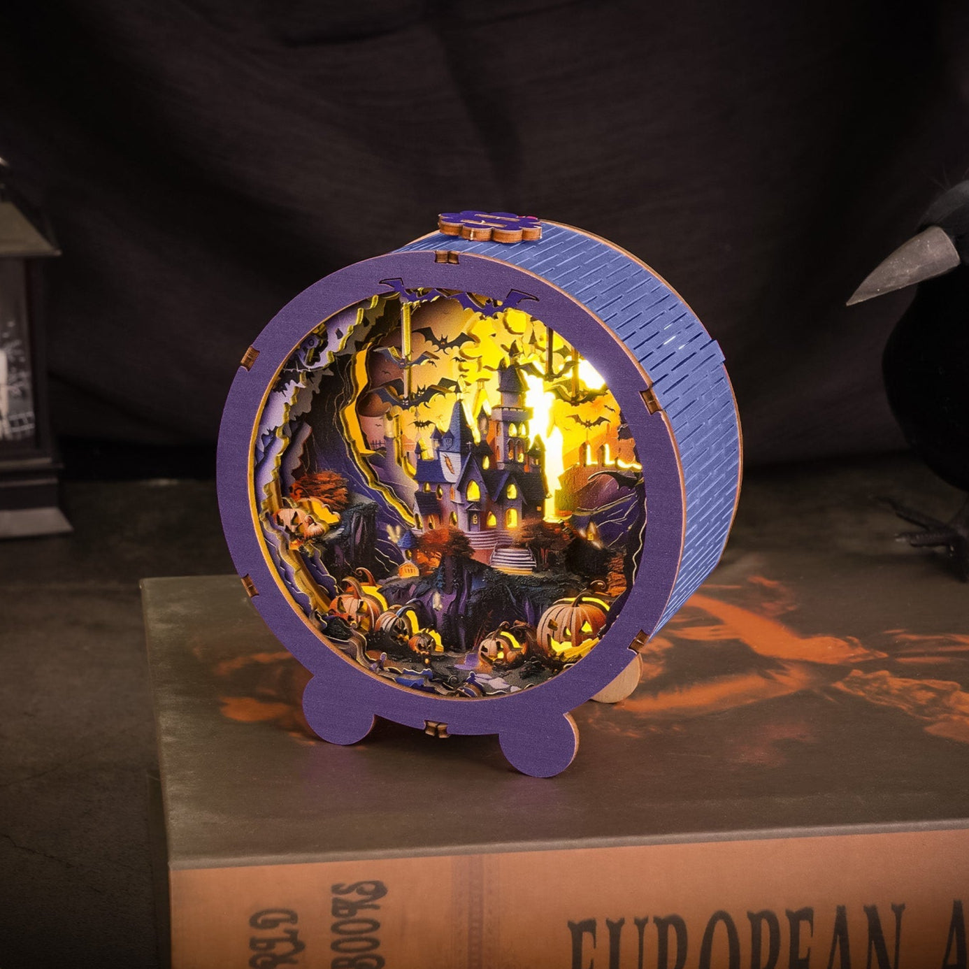 Halloween Castle Kit 3D wooden puzzle night light featuring a spooky scene with pumpkins and a haunted house.