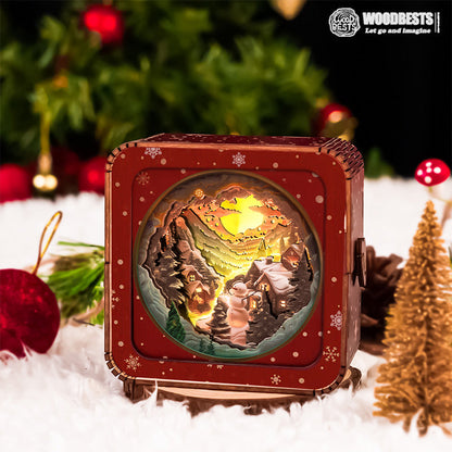 3D wooden puzzle night light featuring a snowy mountain scene with a quaint hut and warm lighting.