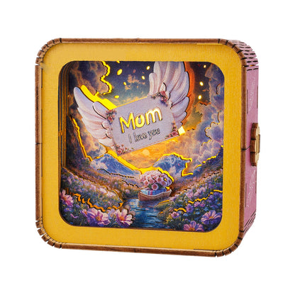 3D wooden puzzle night light featuring a heartfelt 'Mom I love you' design with angel wings and a scenic background.