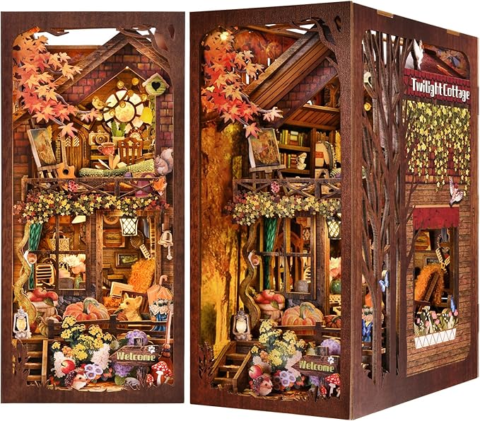Twilight Cottage DIY Book Nook Kit showing autumn leaves, pumpkins, and charming wooden details.