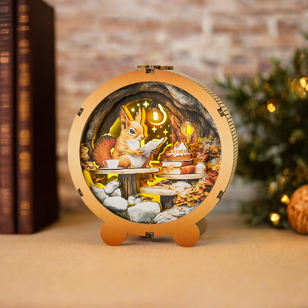 Squirrel's Reading Kit 3D wooden puzzle night light featuring a squirrel reading at a cozy table with lanterns and autumn leaves.