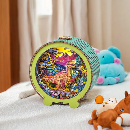 3D wooden dinosaur night light kit showcasing a vibrant dinosaur scene, perfect for children's rooms.