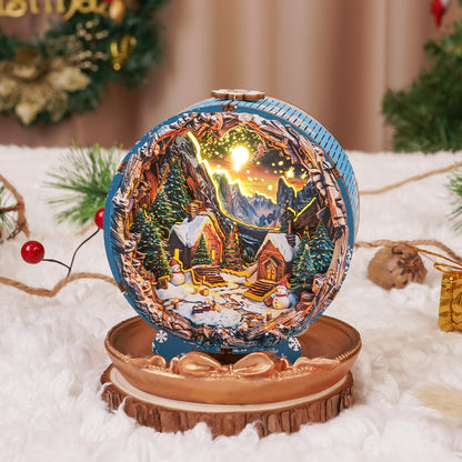 3D wooden puzzle night light featuring a cozy Christmas village with snow-covered cabins and a shining sun.