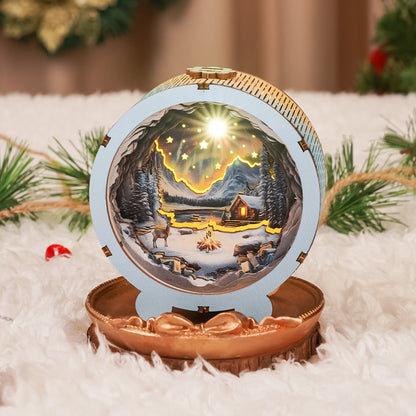 3D wooden puzzle night light featuring a cozy winter scene with stars above a cabin and snow-covered landscape.