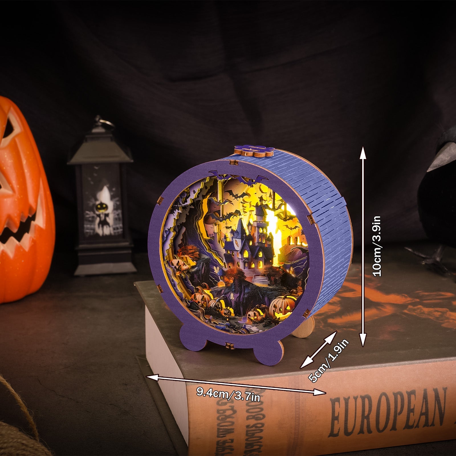 3D wooden Halloween castle night light puzzle, featuring a spooky scene with pumpkins and a haunted house.