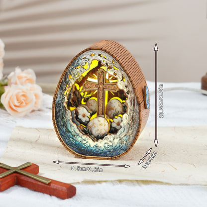 3D wooden Easter egg night light with cross and floral design, showcasing intricate details and glowing interior.