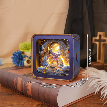 Nativity Kit 3D wooden puzzle night light showcasing a detailed scene, placed on a decorative book.