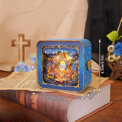 3D wooden puzzle night light shaped like Star of David, displayed on a book with a cross and flowers in the background.